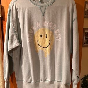 Blue Sweatshirt with Smiley Face